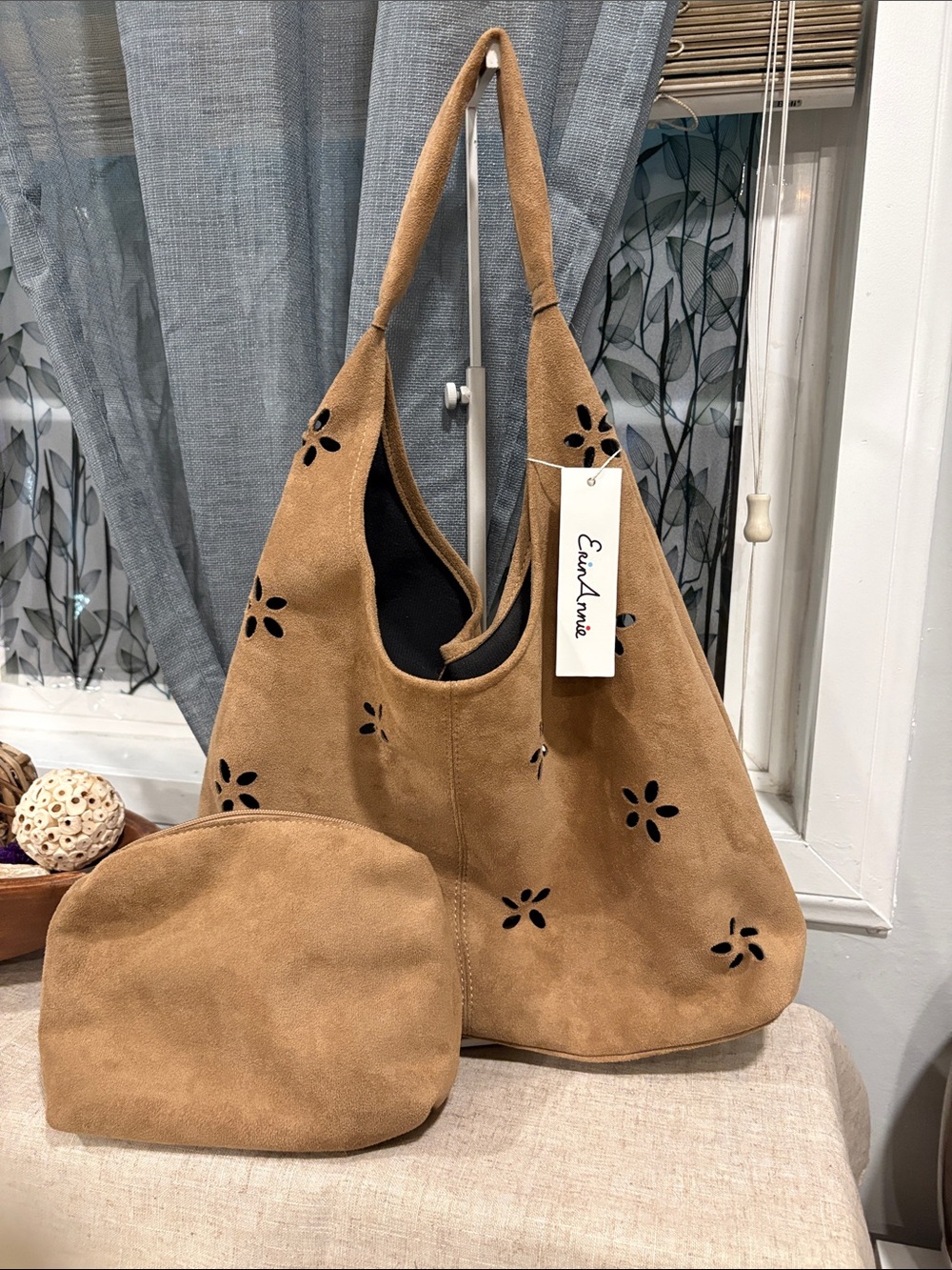 Erin Annie faux shade laser cut floral hobo shoulder bag.